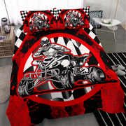 A bed dressed in a motocross-themed bedding set featuring a large red, black, and white graphic of a rider on a quad bike, with two matching pillowcases, shown in a modern bedroom setting.