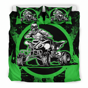 A bedding set featuring a duvet cover and two matching pillowcases with a high-contrast graphic print of an ATV racer in black, white, and bright green.