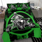 A bedding set featuring a large black and green ATV graphic on the duvet cover and matching pillowcases, shown styled in a bedroom setting.
