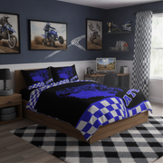 Bedroom with checkered bedding and ATVs on walls