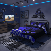 Bedroom with ATV theme decor, including bedspread and wall art.