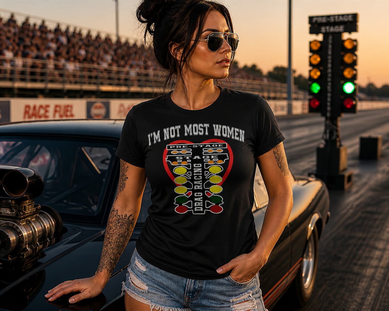 A bold apparel design featuring "I'm Not Most Women" printed on premium women's drag racing t-shirts, v-necks, and hoodies.
