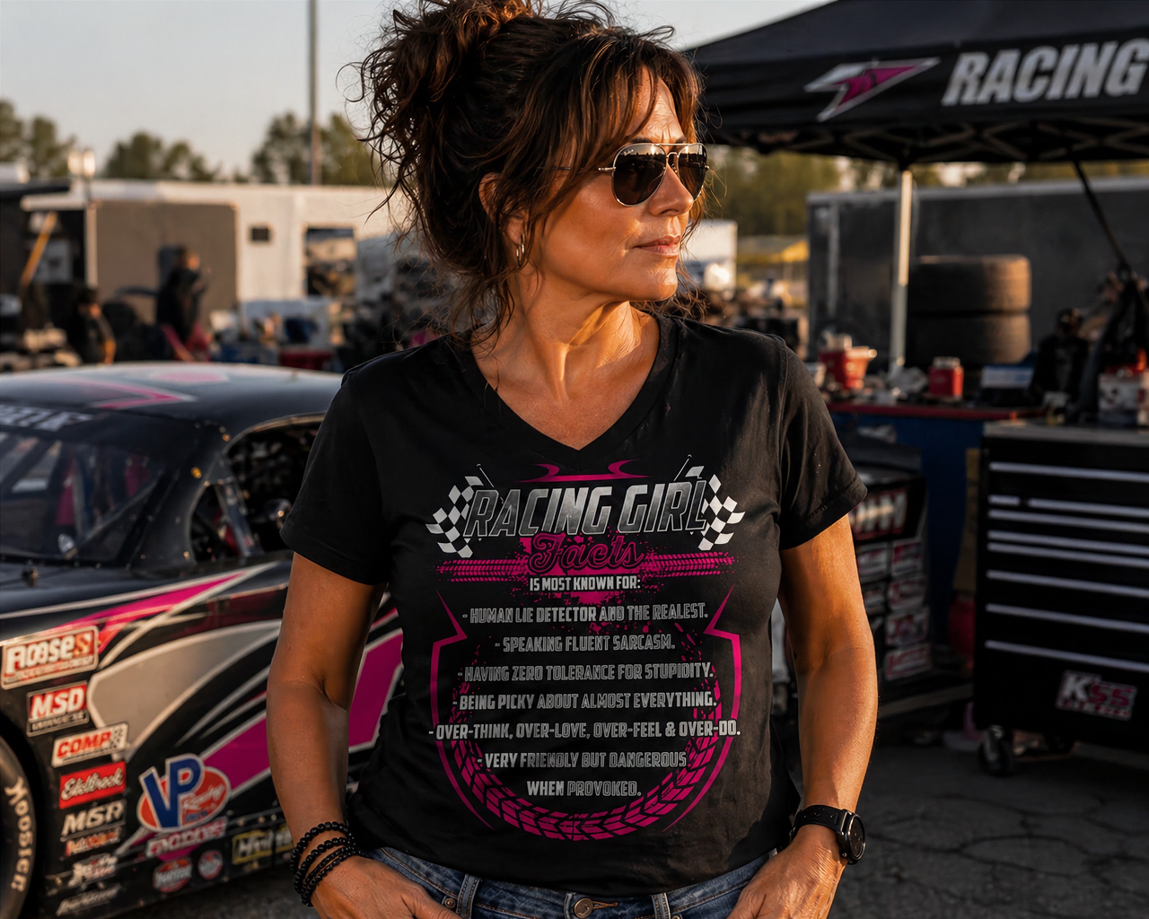 A bold apparel design featuring "Racing Girl Facts" printed on premium women's t-shirts, racerback tanks, and hoodies.