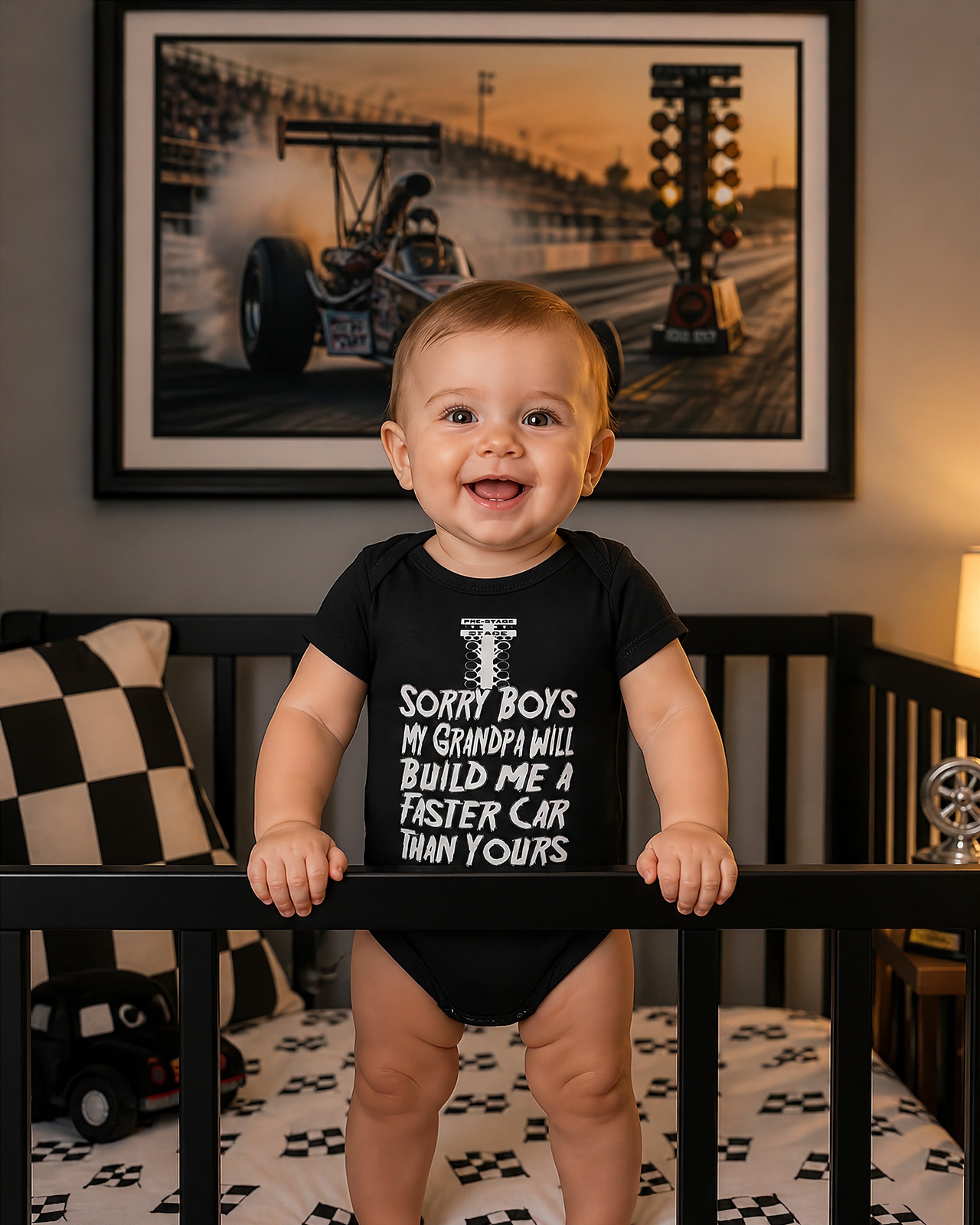 A cute and sassy kids' apparel design featuring the text "Sorry Boys My Grandpa Will Build Me A Faster Car Than Yours" with drag racing graphics, printed on high-quality baby bodysuits, toddler tees, and youth hoodies.
