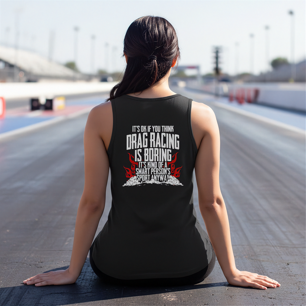 A premium apparel design featuring the phrase "Drag Racing Is A Smart Person's Sport" with sleek racing graphics, printed on high-quality t-shirts, tanks, and hoodies.