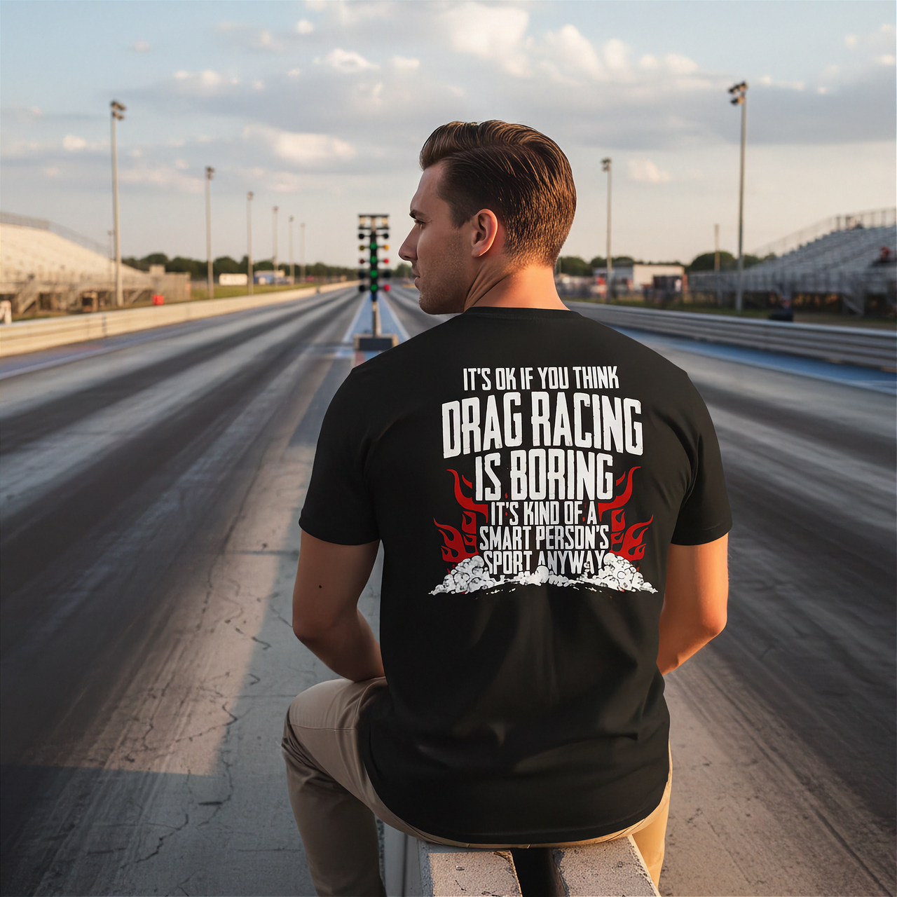 A premium apparel design featuring the phrase "Drag Racing Is A Smart Person's Sport" with sleek racing graphics, printed on high-quality t-shirts, tanks, and hoodies.