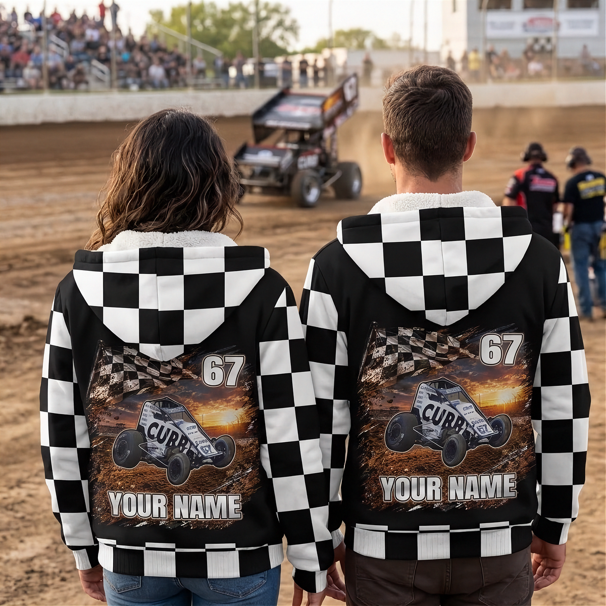 Back view of a couple in matching checkered sherpa jackets with non-wing sprint car artwork, number 67, and “YOUR NAME.”