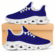 Blue and black checkered sneakers with white soles on a beige box.