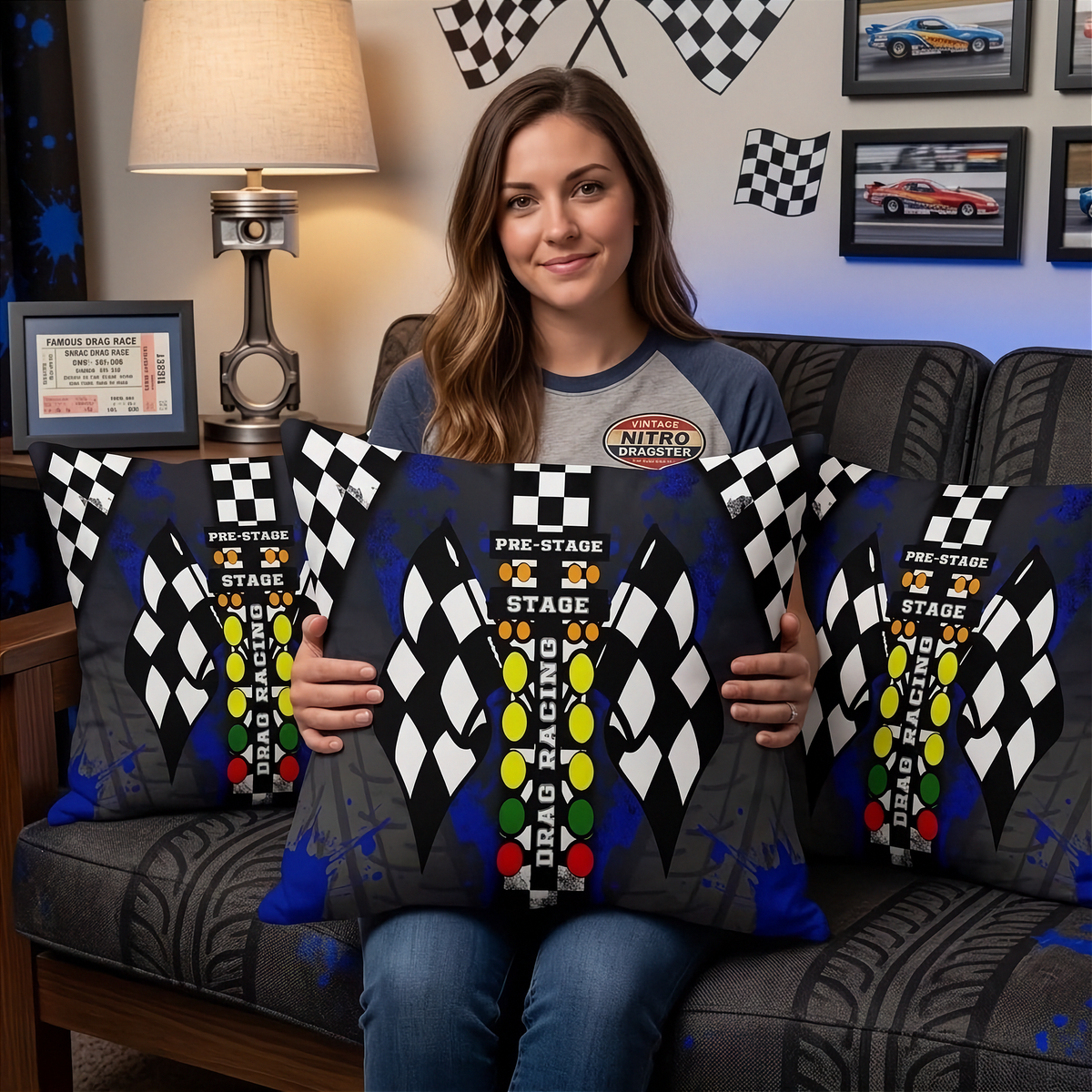 Woman sitting on a sofa at themed drag racing living room holding a drag racing pillow with big DRAG RACING Christmas tree