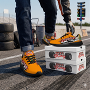 Bright orange drag racing sneakers with high-traction EVA outsoles.