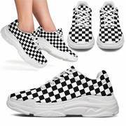 Black and white checkered sneakers with a close-up on a white background