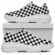 Black and white checkered sneakers on a white background