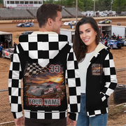 Couple at a dirt track showing the late model jacket’s personalized back artwork and matching chest graphic.