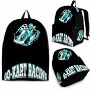 A young boy wearing a Carolina Blue go-kart racing backpack, walking alongside an adult woman toward an outdoor asphalt karting circuit on a bright, sunny afternoon.