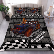 A racing-themed bedding set featuring a duvet cover and two pillowcases with a blue and orange race car graphic, black-and-white checkered flag borders, and the words 'DEMOLITION DERBY' on a bed in a styled bedroom.