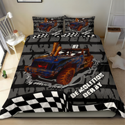 A racing-themed bedding set featuring a duvet cover and two pillowcases with a graphic of a blue and orange race car, checkered flags, and the words 'Demolition DERBY' on a gray background, shown on a bed in a bedroom.