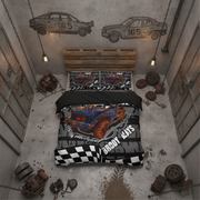 A top-down bedroom scene styled like a garage, featuring a bed with a racing-themed bedding set. The duvet cover and pillowcases display a blue and orange race car with flames, a black-and-white checkered pattern, and the text 'Demolition derby'.