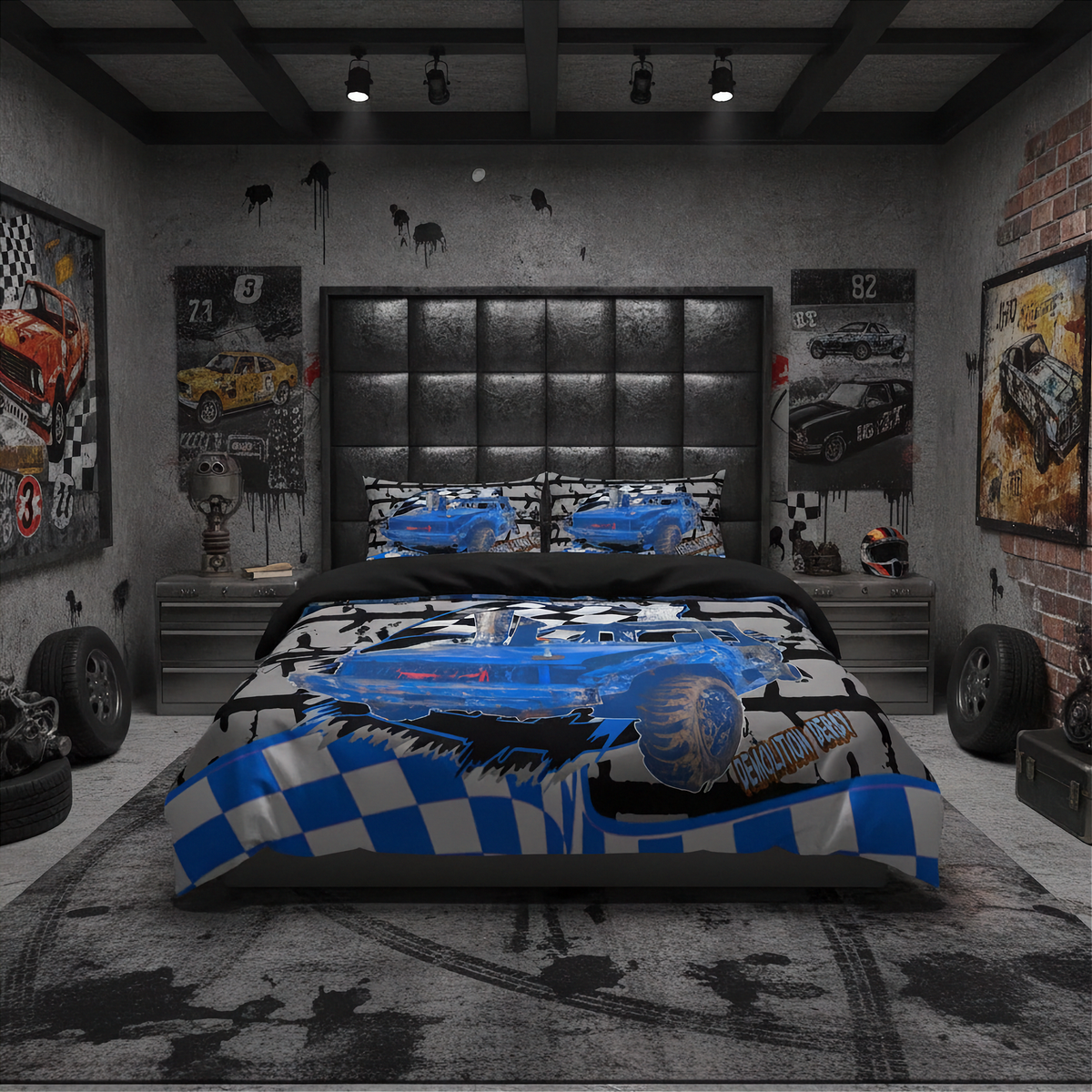 A bed dressed in a blue, black, and gray racing-themed bedding set with checkered and striped patterns, styled in a dark, industrial-themed bedroom with racing posters, tires, and a black headboard.