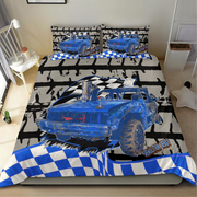 A bed dressed in a racing-themed bedding set featuring a large blue demolition derby car graphic, black-and-white checkered patterns, and bold text on the duvet cover and matching pillowcases, shown in a bedroom setting.