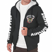 A man wearing a black zip-up hoodie with a white sherpa-lined hood, featuring a 'DRAG RACING' graphic on the left chest and white text graphics down both sleeves, layered over a white t-shirt.