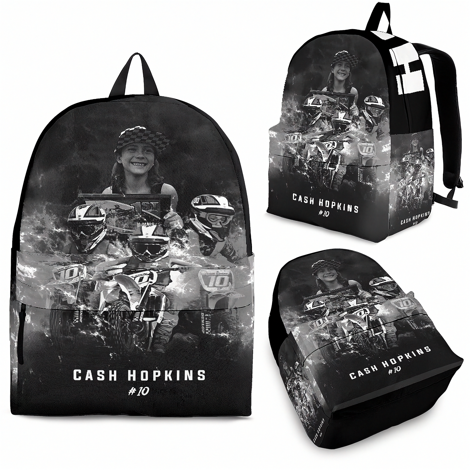 A black backpack shown from multiple angles on a white background, featuring a grayscale motocross graphic with the text 'CASH HOPKINS #10' and a portrait of a woman. No visible brand logo is present.