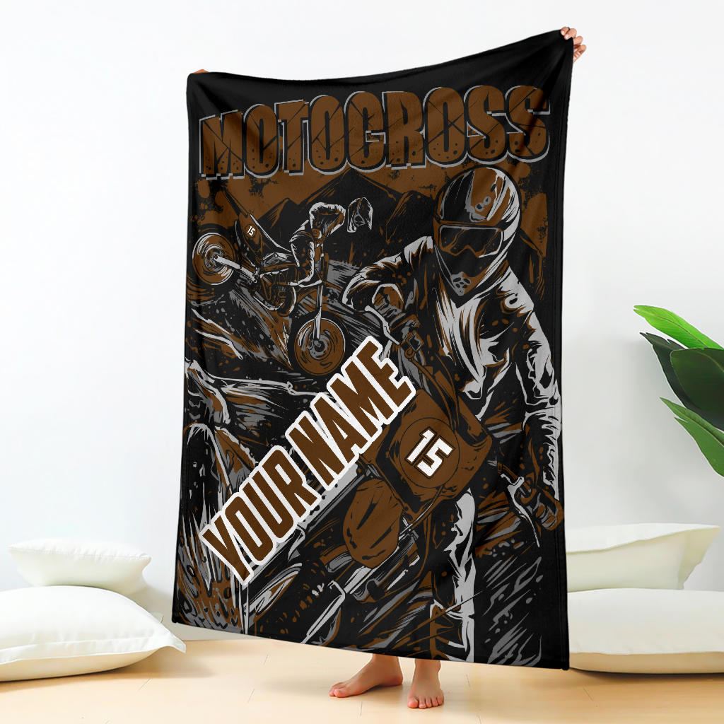 Brown and black custom motocross blanket held upright, showing dirt bike riders, “Your Name” placeholder and sample number 15.