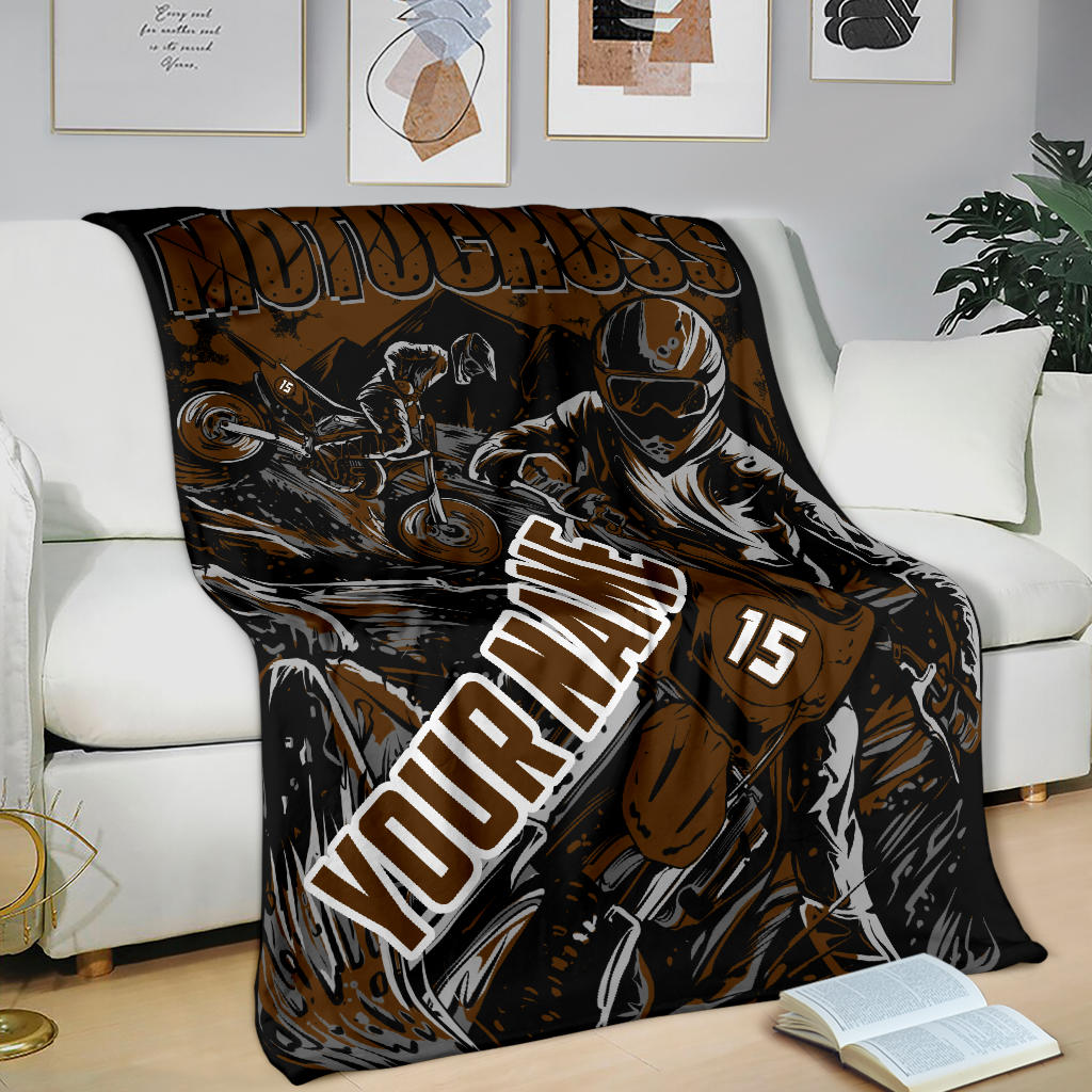 Brown and black custom motocross blanket held upright, showing dirt bike riders, “Your Name” placeholder and sample number 15.
