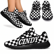 Black and white checkered sneakers with 'CINDY' branding on a white background