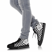 Black and white checkered high-top sneakers worn with light gray jeans on a white background