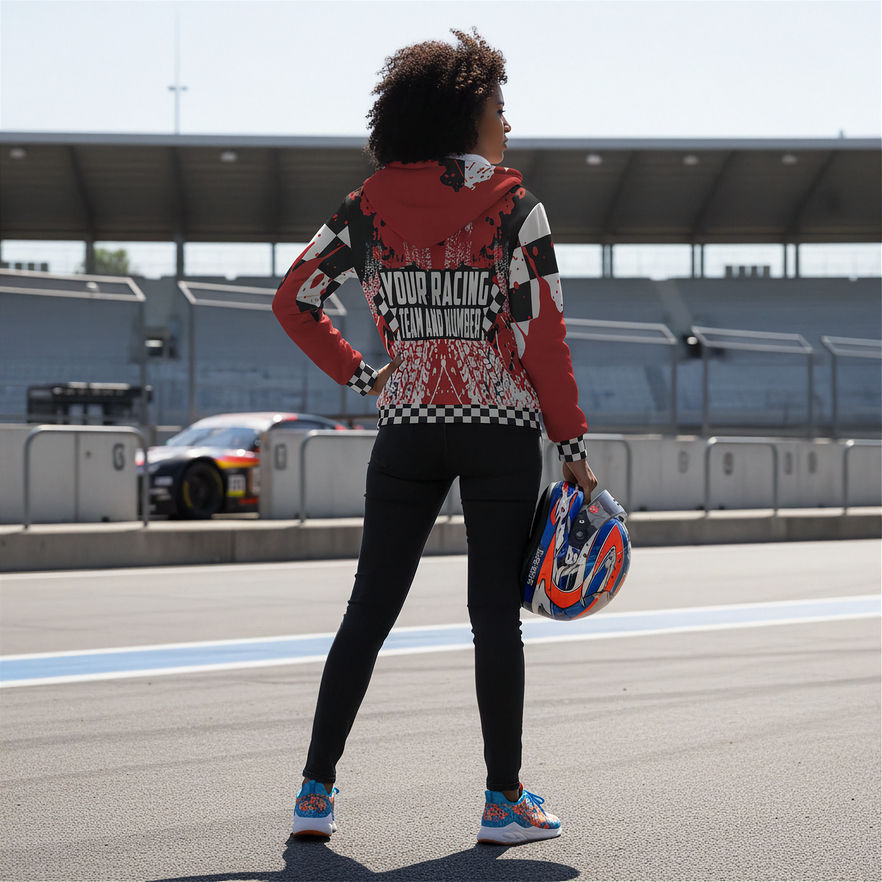 woman wearing a custom racing sherpa jacket in a race track