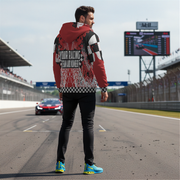 man wearing a custom racing sherpa jacket in a race track