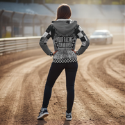 Woman wearing a racing-themed custom sherpa  jacket on a dirt track