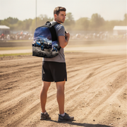 A man standing in a dirt racetrack wearing a UTV buggy backpack