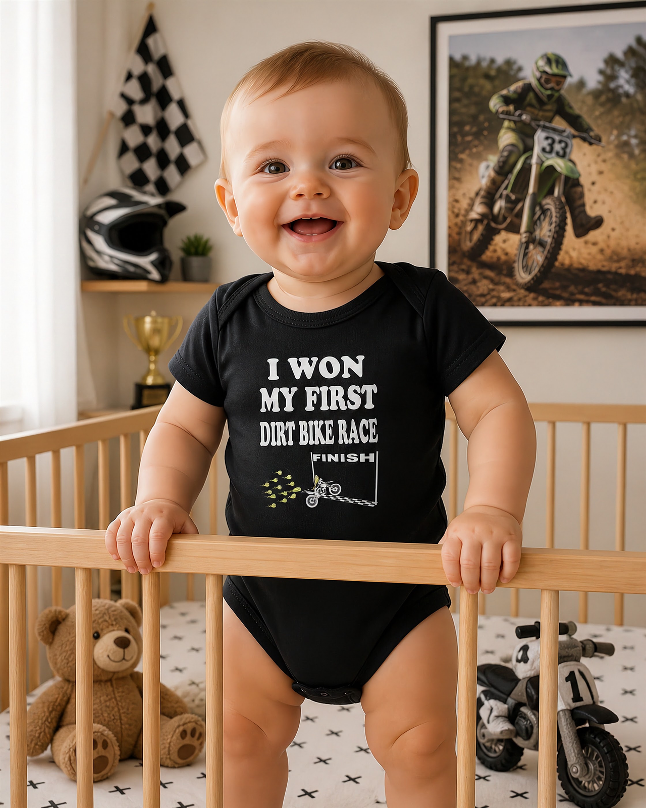 Cute baby onesies and toddler shirts featuring the "I Won My First Dirt Bike Race" graphic, crafted from ultra-soft ringspun cotton for future motocross champions.