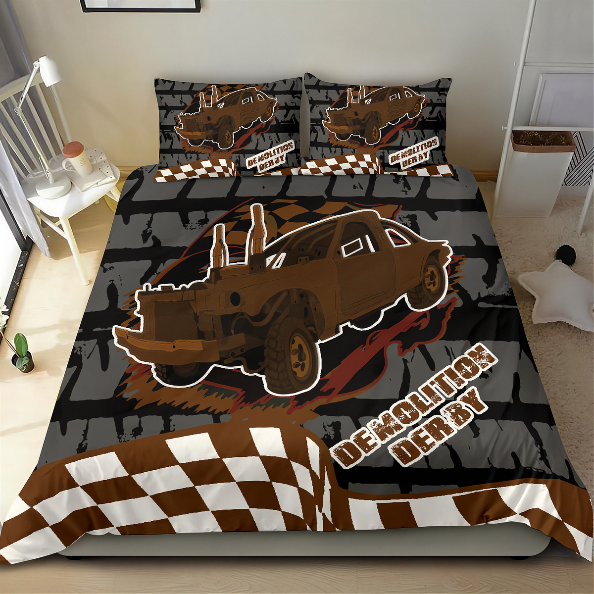 A bed dressed in a custom 'Demolition Derby' themed bedding set, featuring a brown off-road truck graphic, a black-and-white checkered pattern, and 'DEMOLITION DERBY' text on the duvet cover and matching pillowcases.