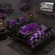 A racing-themed bedding set styled on a bed in a dark, modern bedroom. The set features a purple and black graphic design with a checkered pattern on the corner, matching purple and black pillows, and a purple and black graphic duvet cover.
