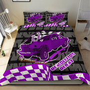 A racing-themed bedding set featuring a red, black, and gray checkered pattern with a large red race car graphic, styled on a bed in a dark gray modern bedroom.