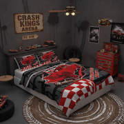 A racing-themed bedding set styled on a bed in a dark gray garage-like room. The set includes a comforter and two matching pillowcases with a large red race car graphic, black and gray track patterns, and red-and-white checkered sections.
