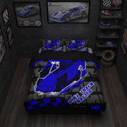 A racing-themed bedding set featuring a duvet cover and two pillowcases with a drag racing track design, checkered flags, and colorful buttons on a black background, shown on a bed in a bedroom setting.