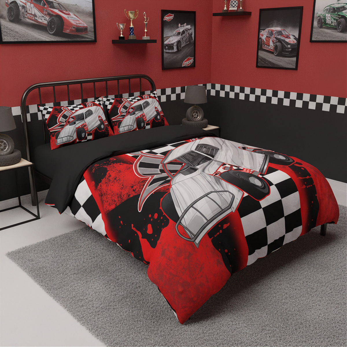 A racing-themed bedding set displayed on a bed in a styled bedroom. The set includes a duvet cover and two matching pillowcases featuring a graphic print of a white race car on a red, black, and white checkered pattern with paint splatters.