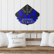 A diamond-shaped wall decal with a black and blue 'Dirt Track Racing Modified Forever' graphic is displayed on a white paneled wall above a wooden bench with white pillows.
