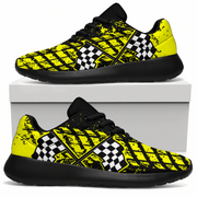 Yellow and black checkered sneakers with a white box in the background