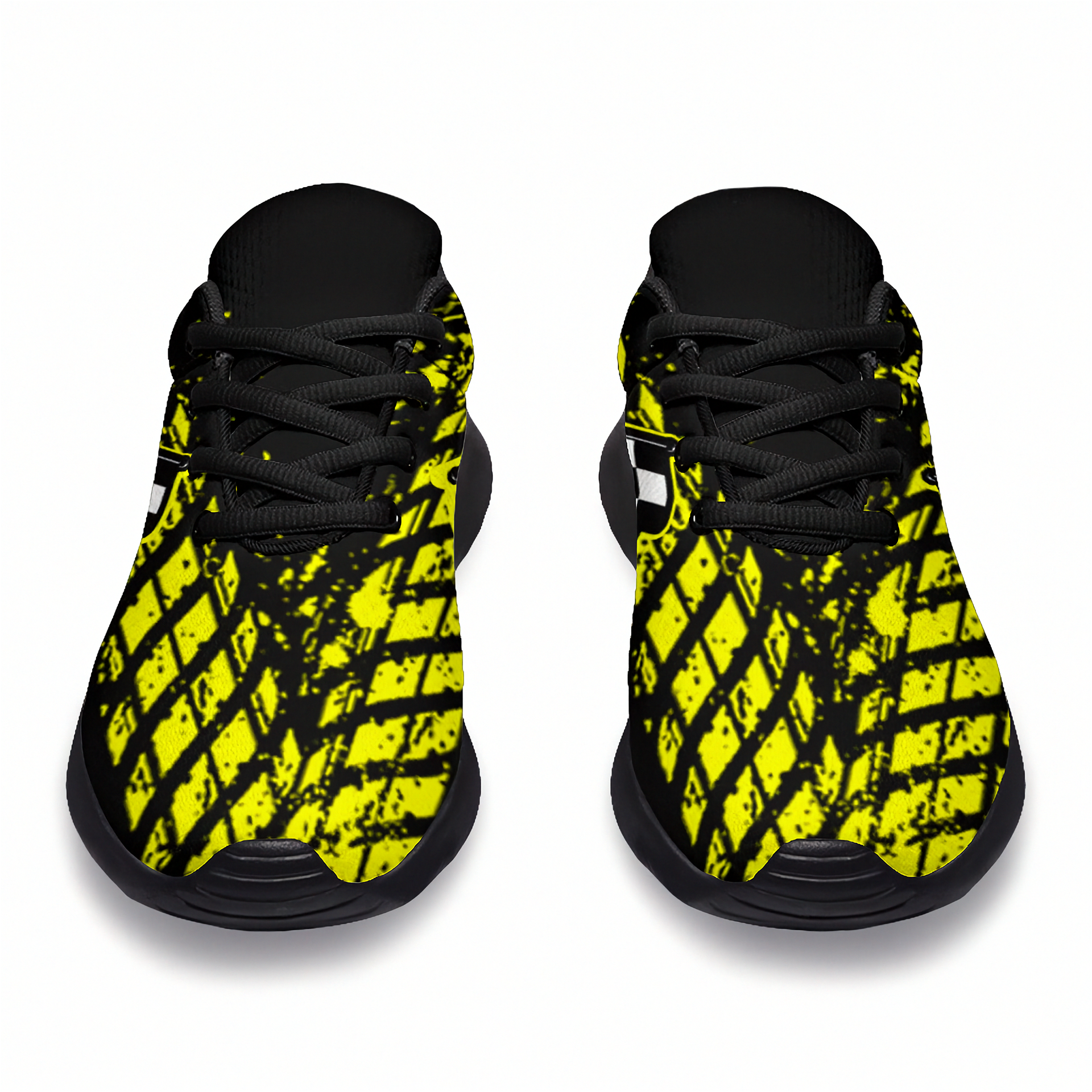 Black and yellow patterned shoes on a white background