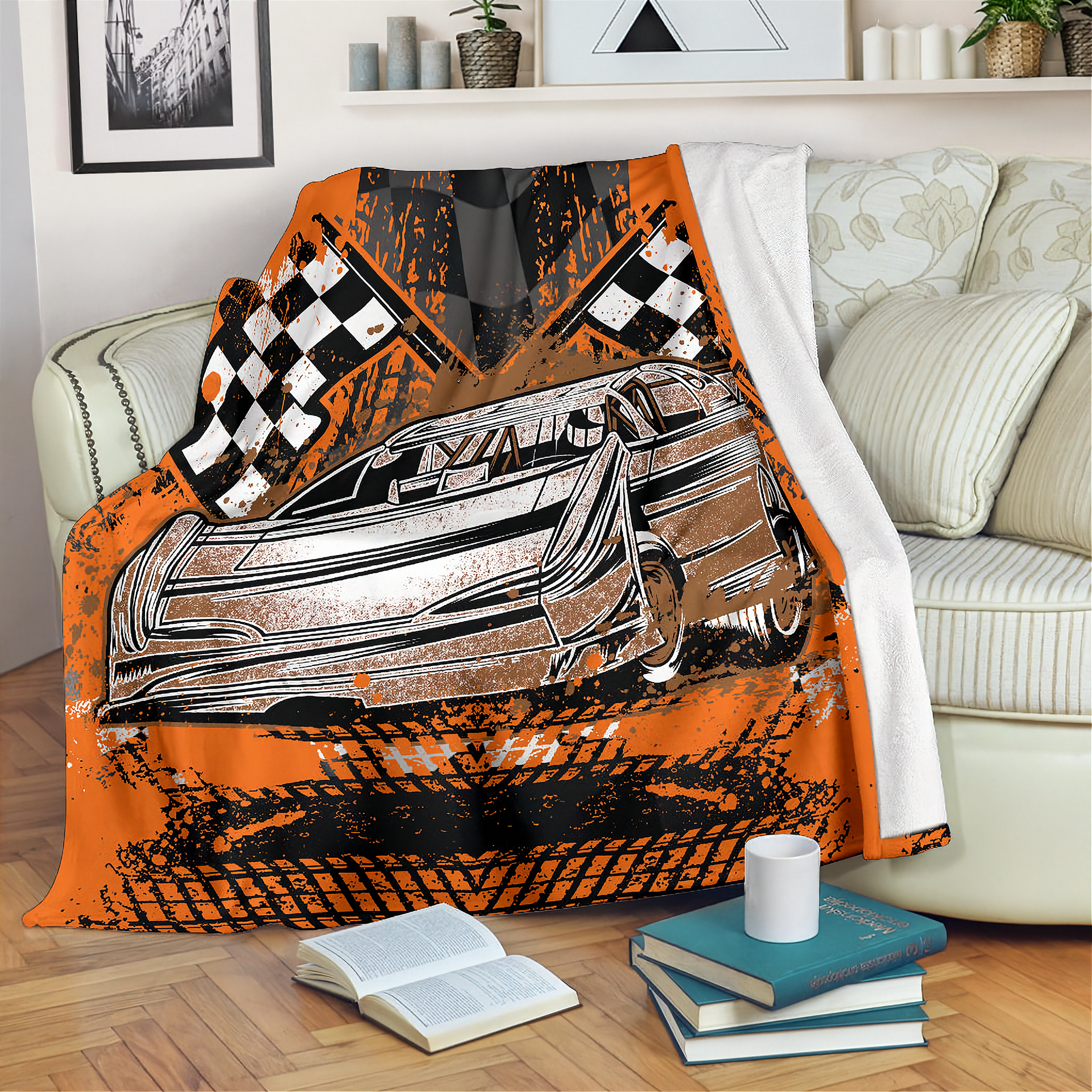 Car-themed blanket with checkered pattern draped over a chair in a living room.