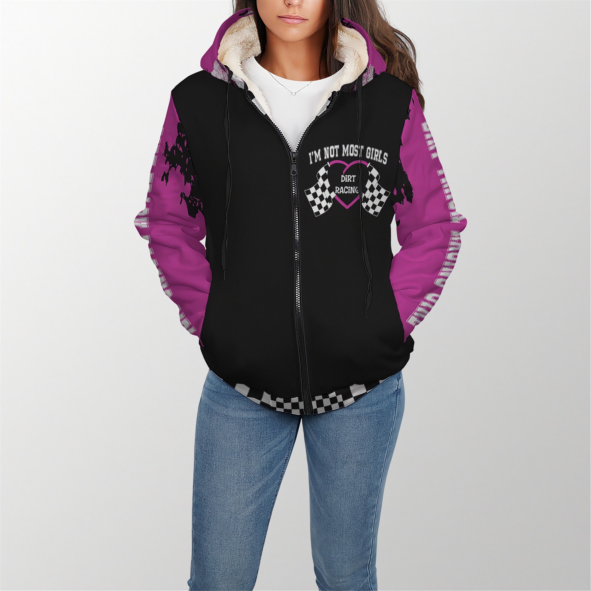 Woman wearing a pink sherpa hoodie with 'I'm Not Most Girls Dirt Racing' text on a white background