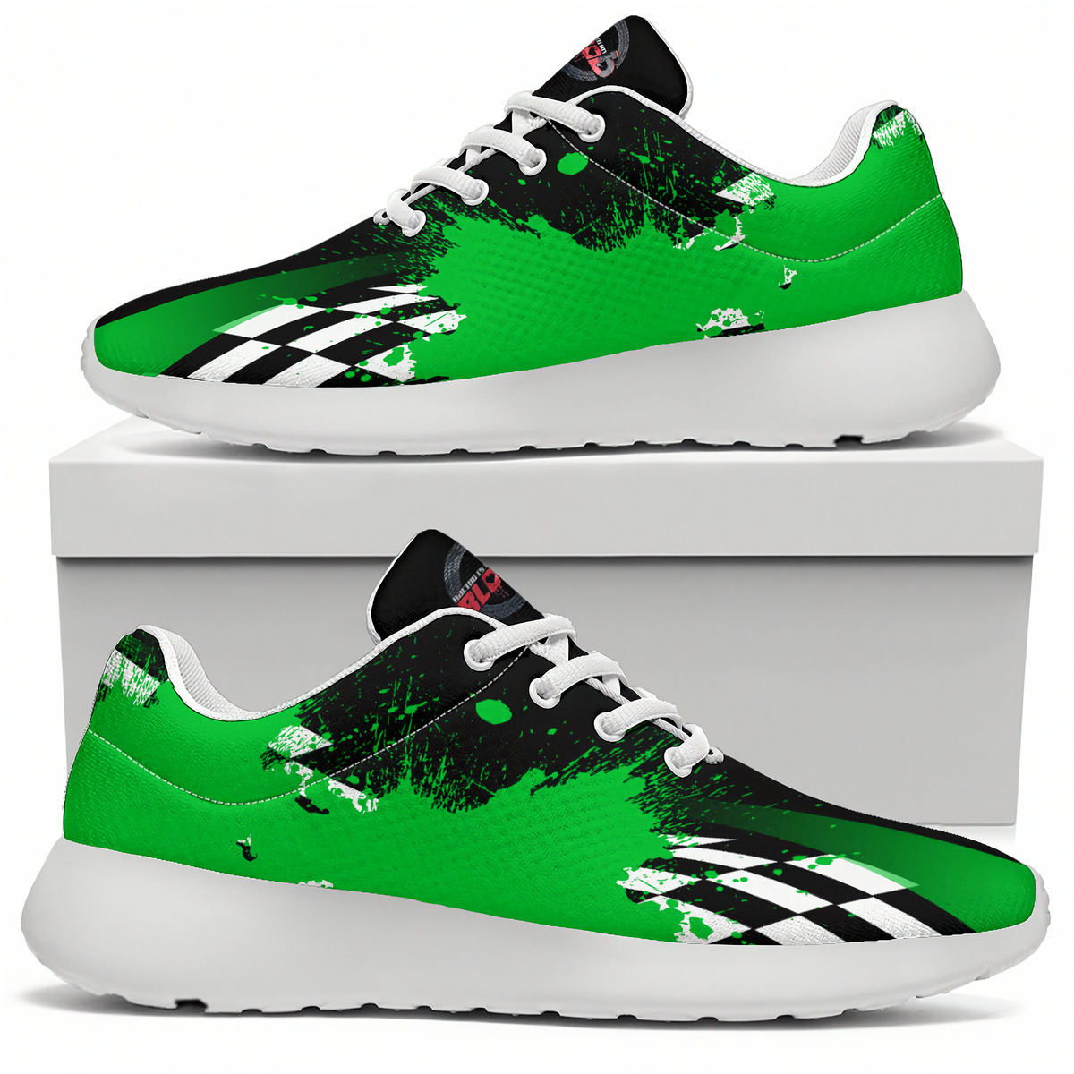 A pair of low-top athletic sneakers with a vibrant green and black paint-splatter design, white laces, and a black-and-white checkered pattern near the toe. One shoe is displayed on top of a white shoebox, and the other is shown from the side profile below, set against a clean white background.