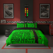 A racing-themed bedding set featuring a bright green duvet cover and matching pillowcases with black text and red checkered stripes, styled in a dark gray and red bedroom setting with car posters and a race light.