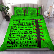 A bright green bedding set with a 'Drag Racer's Prayer' graphic printed on the comforter and two matching pillowcases, shown on a bed in a modern bedroom setting.