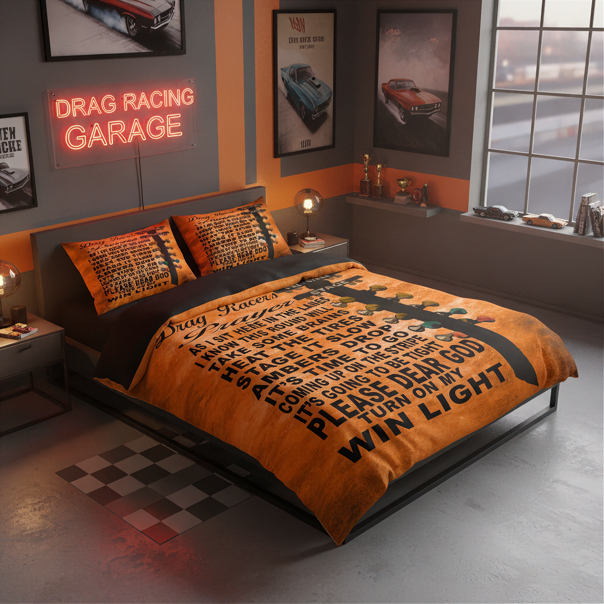 A bed dressed in an orange and black drag racing themed bedding set, styled in a modern garage-themed bedroom with a neon sign, car posters, and a checkered floor mat.
