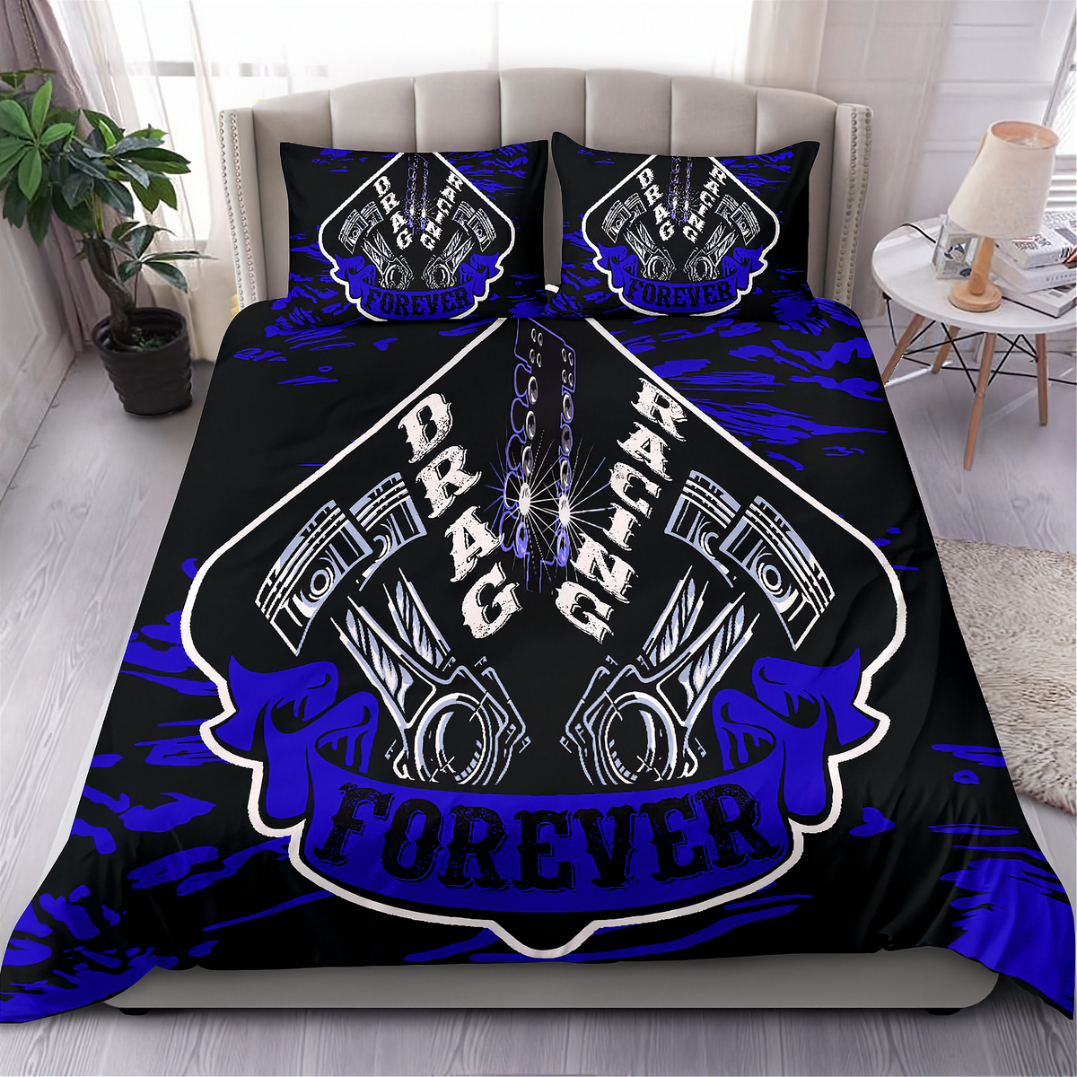A bed dressed in a black bedding set with a bold blue and white 'Drag Racing Forever' graphic featuring pistons and chains, shown in a styled bedroom setting.